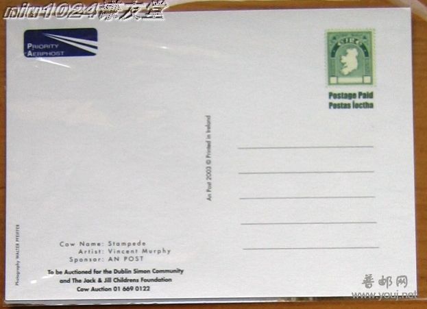 爱尔兰2003年邮票纹身的奶牛及放大镜中的邮票邮资片（背面）.JPG